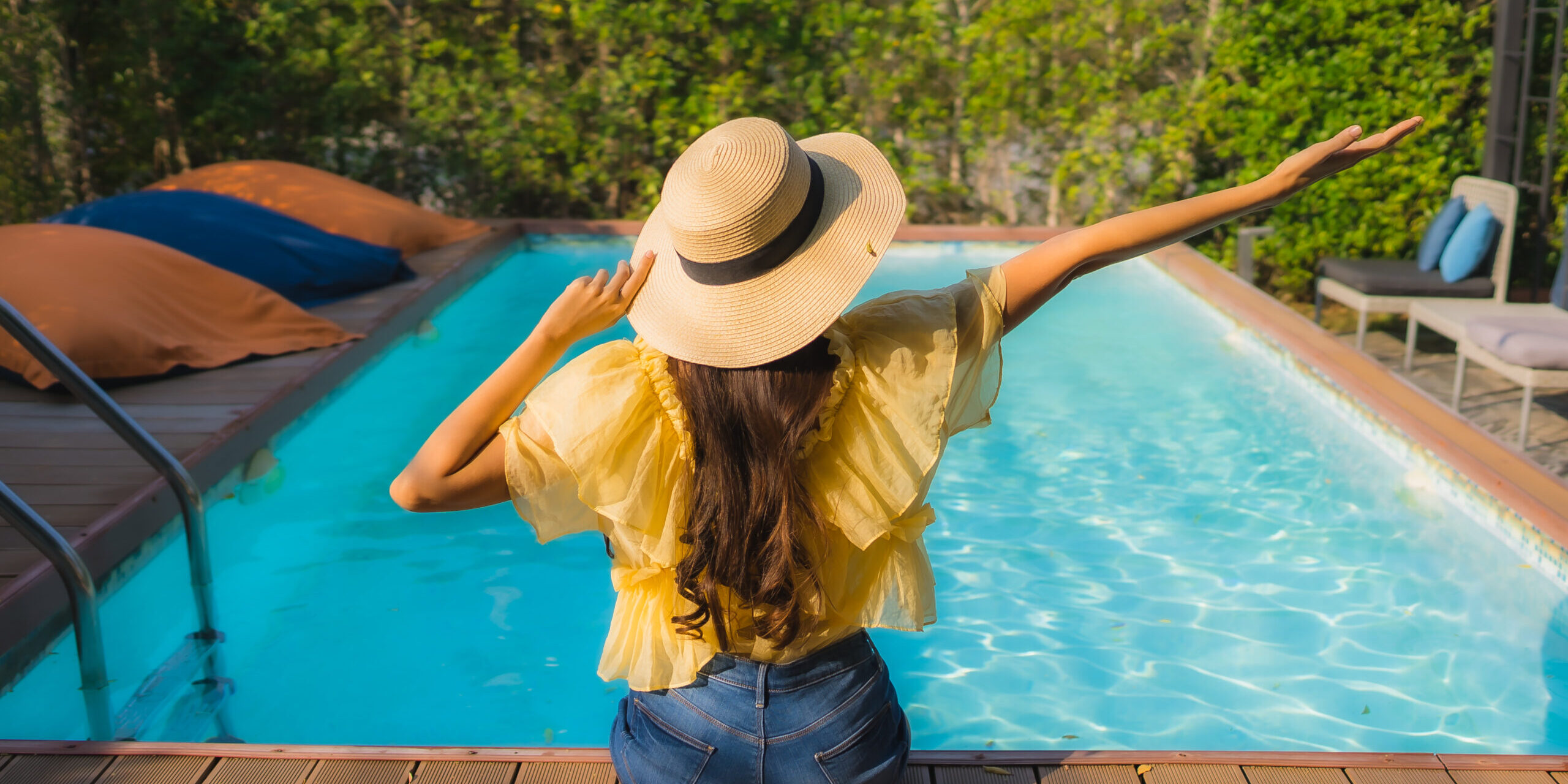 Portrait young asian woman happy smile relax around outdoor swim